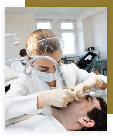 dentist performing surgery on patient